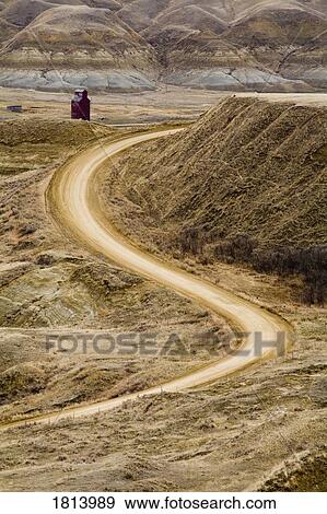Stock Photo - Empty curving road. Fotosearch