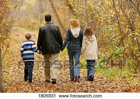Family walking together View Large Photo Image Stock Image - Family walking together. Fotosearch