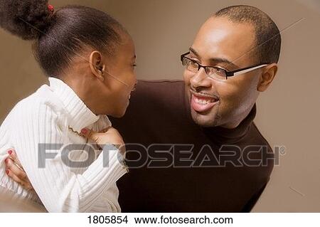 Father looking at daughter View Large Photo Image Picture - Father looking at daughter. Fotosearch