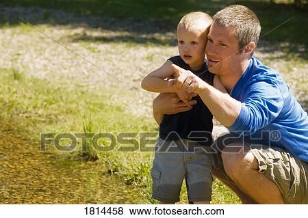 Father with his son View Large Photo Image Stock Photo - Father with his son. Fotosearch