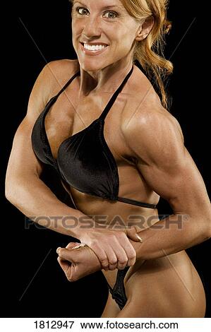 Stock Photo - Female bodybuilder. Fotosearch