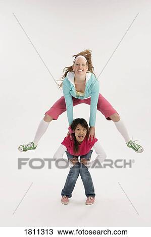 Friends playing together View Large Photo Image Stock Image - Friends playing together. Fotosearch
