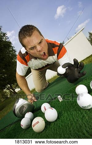 Frustrated golfer yelling at golf balls View Large Photo Image Stock Image - Frustrated golfer yelling at golf balls. Fotosearch