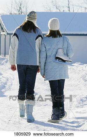 Girls wearing winter clothing View Large Photo Image Stock Photo - Girls wearing winter clothing. Fotosearch