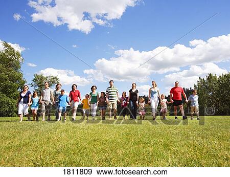 Group of people holding hands View Large Photo Image Stock Photo - Group of people holding hands. Fotosearch