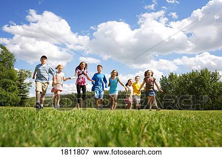 Kids holding hands View Large Photo Image Stock Photo - Kids holding hands. Fotosearch