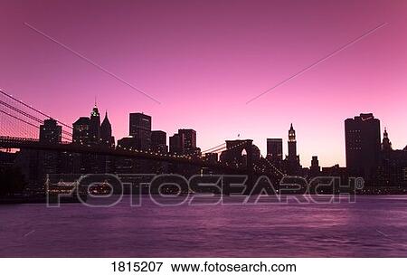 Lower Manhattan Skyline at sunset in Brooklyn, New York City, New York, USA View Large Photo Image Stock Photo - Lower Manhattan Skyline at sunset in Brooklyn, New York City, New York, USA . Fotosearch