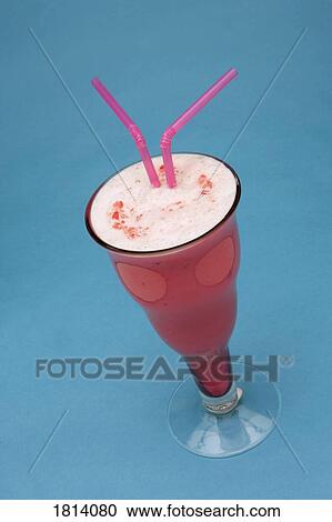 Stock Image - Milkshake with two straws. Fotosearch
