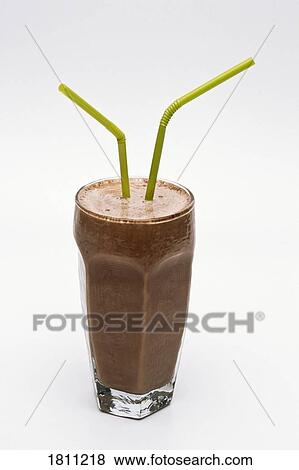 Milkshake with two straws View Large Photo Image Stock Photo - Milkshake with two straws. Fotosearch