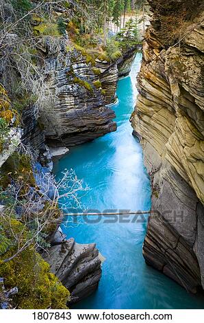 Mountain river canyon outlet, Jasper National Park, Alberta, Canada View Large Photo Image Stock Image - Mountain river canyon outlet, Jasper National Park, Alberta, Canada. Fotosearch