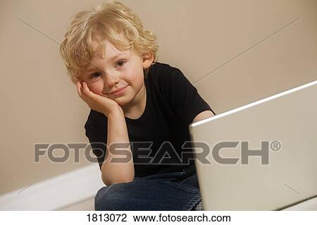 Stock Image - Portrait of boy. Fotosearch