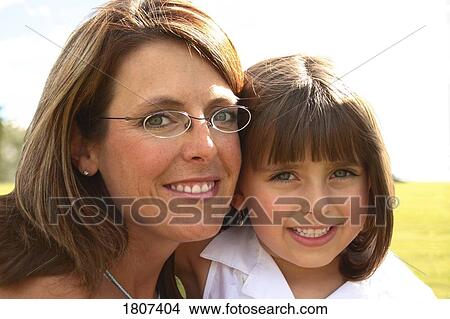 Picture - Portrait of mother and daughter. Fotosearch
