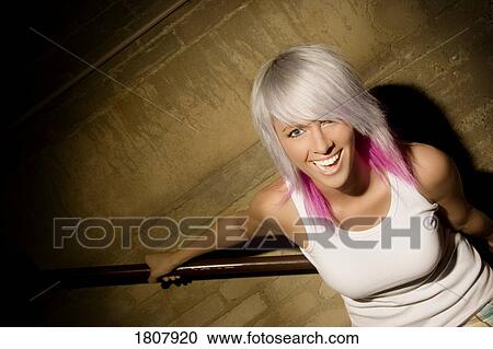 Stock Image - Portrait of smiling woman. Fotosearch