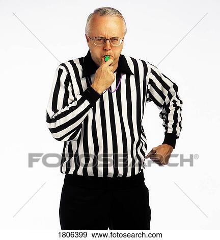 Stock Photo - Referee blowing a whistle. Fotosearch