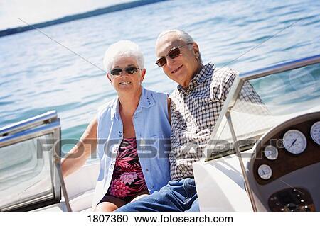Senior couple boating View Large Photo Image Stock Image - Senior couple boating. Fotosearch