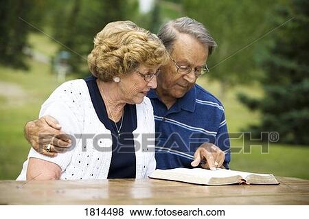 Senior couple reading Bible View Large Photo Image Stock Photo - Senior couple reading Bible. Fotosearch