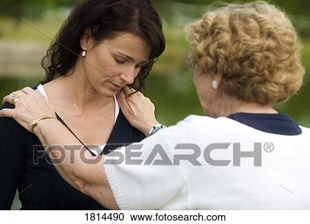 Senior woman consoling her daughter View Large Photo Image Stock Image - Senior woman consoling her daughter. Fotosearch