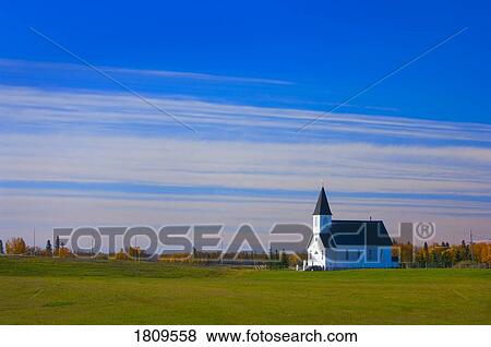 Stock Photo - Traditional steeple church in the morning . Fotosearch