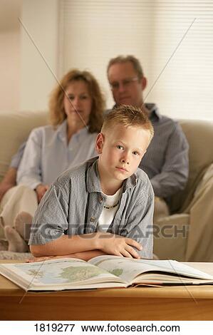 A boy with an atlas View Large Photo Image Stock Photo - A boy with an atlas. Fotosearch