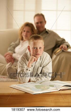 A boy with an atlas View Large Photo Image Stock Photo - A boy with an atlas. Fotosearch