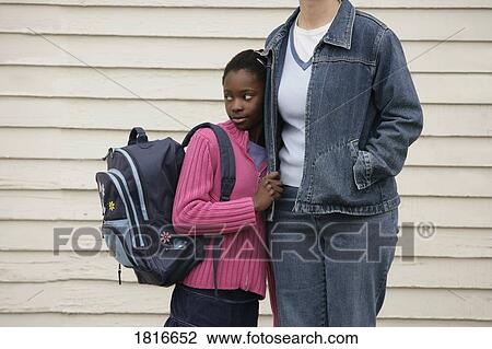 Stock Image - A shy girl. Fotosearch