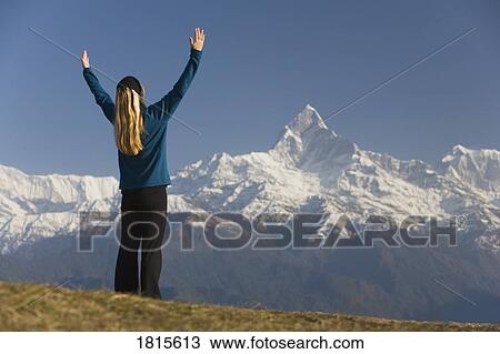 A woman in awe of nature View Large Photo Image Stock Image - A woman in awe of nature. Fotosearch