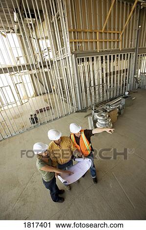 Architects and construction workers View Large Photo Image Stock Image - Architects and construction workers. Fotosearch