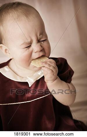 Stock Image - Baby with big tears. Fotosearch