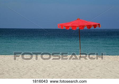 Beach umbrella on tropical beach in Phuket, Thailand View Large Photo Image Stock Image - Beach umbrella on tropical beach in Phuket, Thailand . Fotosearch