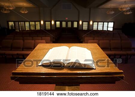 Picture - Bible on podium in church. Fotosearch