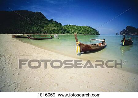 Boats at Ko Phi Phi Don island in Thailand View Large Photo Image Stock Photo - Boats at Ko Phi Phi Don island in Thailand . Fotosearch