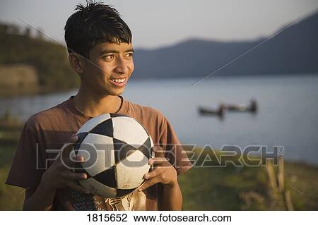 Boy with soccer ball View Large Photo Image Stock Image - Boy with soccer ball . Fotosearch
