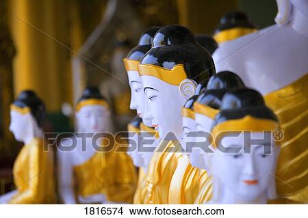 Picture - Buddhas at Shwedagon Pagoda, Yangon, Myanmar, Burma . Fotosearch