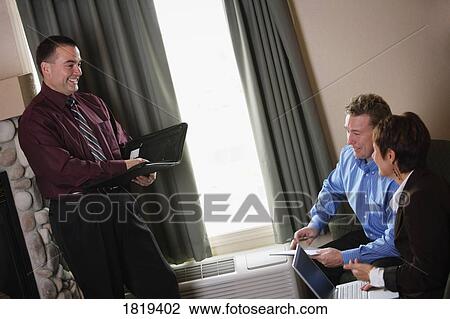 Stock Image - Business meeting. Fotosearch