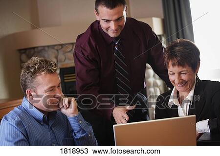 Business people meeting with computer View Large Photo Image Stock Image - Business people meeting with computer. Fotosearch