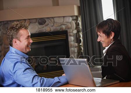 Business people meeting with computer View Large Photo Image Stock Photography - Business people meeting with computer. Fotosearch