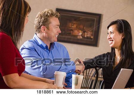 Businesspeople meeting together View Large Photo Image Stock Image - Businesspeople meeting together. Fotosearch