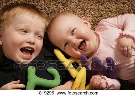 Children playing together View Large Photo Image Stock Photograph - Children playing together . Fotosearch