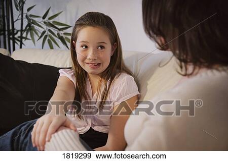 Daughter with bad news View Large Photo Image Stock Photo - Daughter with bad news . Fotosearch