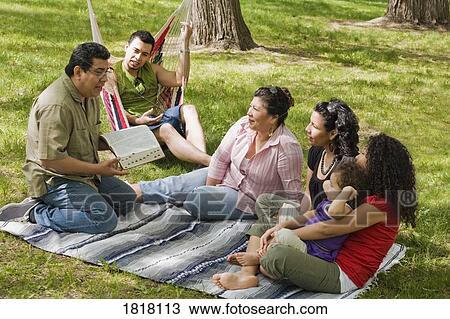 Stock Image - Family Bible study. Fotosearch