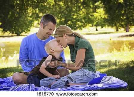 Family in the park View Large Photo Image Stock Image - Family in the park. Fotosearch