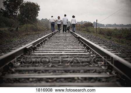 Family walking together View Large Photo Image Stock Photo - Family walking together . Fotosearch