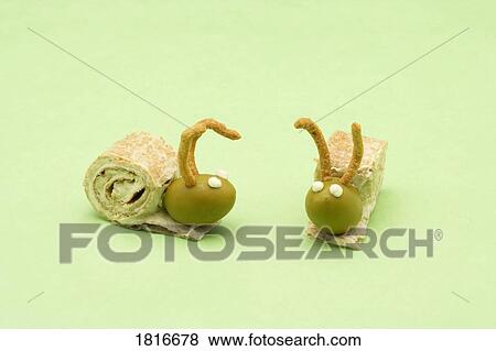 Stock Photo - Food formed like bugs. Fotosearch