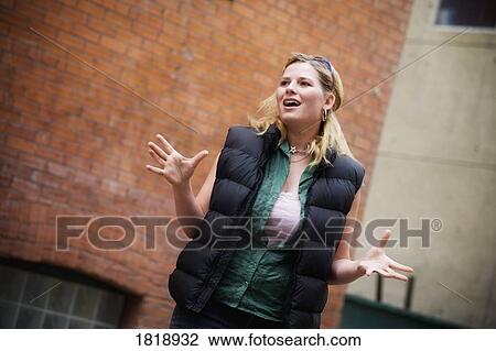 Stock Image - Girl talking. Fotosearch