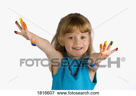 Stock Photo - Girl with paint on her fingers. Fotosearch