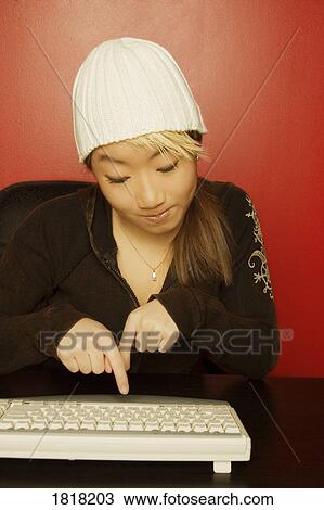 Girl working on keyboard View Large Photo Image Stock Image - Girl working on keyboard. Fotosearch