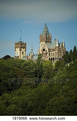 Historic building over wooded area View Large Photo Image Stock Photograph - Historic building over wooded area. Fotosearch