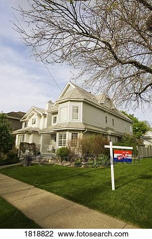 House with a sold sign View Large Photo Image Stock Image - House with a sold sign. Fotosearch