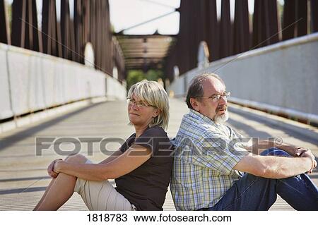 Husband and wife at odds View Large Photo Image Stock Image - Husband and wife at odds. Fotosearch