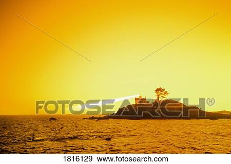 Stock Photo - Lighthouse at sunset, Crescent city, California, U. S. A. Fotosearch